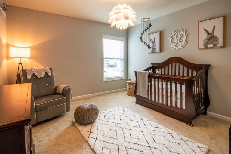Modern nursery with crib — Nanit vs Owlet vs VTech baby monitor comparison