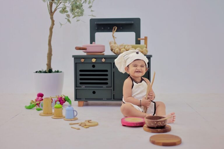 Baby playing with first toys — parent-reviewed newborn toy picks