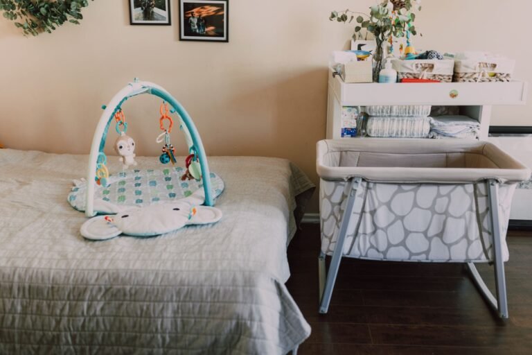 Cozy nursery with crib, changing table and baby essentials — photo by RDNE Stock project on Pexels