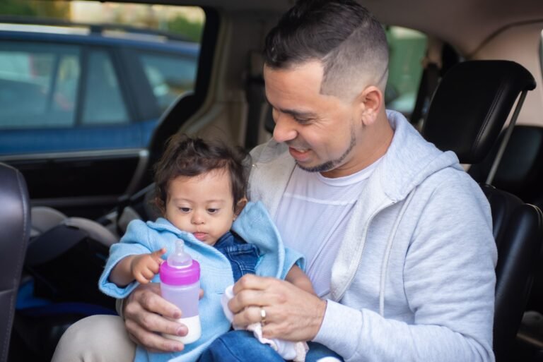 Diono Radian 3R vs Graco 4Ever car seat comparison 2026 — a parent and baby inside a family car