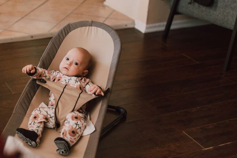 Baby settled in a bouncer seat at home — Ingenuity SimpleComfort baby swing parent review 2026 — photo by RDNE Stock project on Pexels