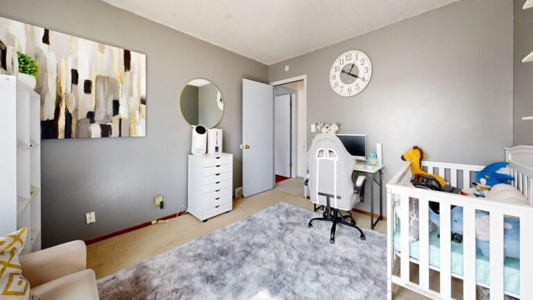 Modern nursery corner with a crib — the room a no-WiFi baby monitor watches