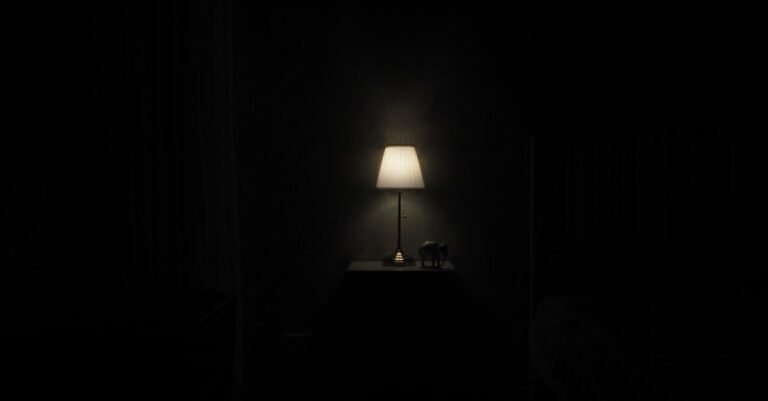 Hatch Restore 3 vs Hatch Rest comparison 2026 — lit lamp on a bedside nightstand in a dark room