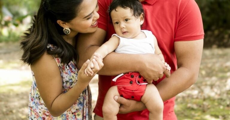 Parents out with their baby on a sunny day — RUVALINO vs Skip Hop Forma diaper bag backpack comparison